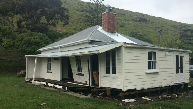 The cottage after the tsunami knocked it off its piles and washed away the deck and verandah.